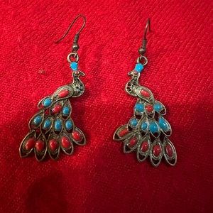 Bronze peacock earrings with turquoise and red beading